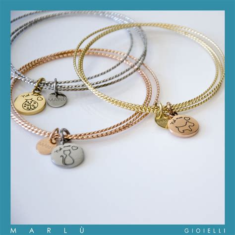 Bracciali personalizzati in acciaio e con charms .